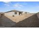 Large backyard providing ample space for recreation and relaxation at 1587 S 239Th Dr, Buckeye, AZ 85326