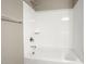 Clean bathroom with a shower/tub combo and a single shelf at 1587 S 239Th Dr, Buckeye, AZ 85326