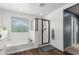 Bathroom features a shower and tub combo at 1649 N 212Th Dr, Buckeye, AZ 85396