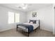 Bedroom with double bed and ceiling fan at 1649 N 212Th Dr, Buckeye, AZ 85396