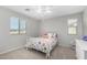 Bedroom with double bed, ceiling fan, and window blinds at 1649 N 212Th Dr, Buckeye, AZ 85396