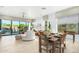 Casual dining area with a rustic wood table, adjacent to the kitchen and living room at 16611 S 9Th St, Phoenix, AZ 85048