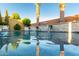 Inviting pool area with water features and palm trees at 16611 S 9Th St, Phoenix, AZ 85048