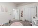 Bright bedroom with a door to the hallway and lots of closet space at 16831 S 14Th Ln, Phoenix, AZ 85045