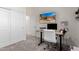 Home office with a standing desk and plenty of space to work at 16831 S 14Th Ln, Phoenix, AZ 85045