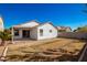 Large backyard with grassy area and gravel pathway at 1749 W Desert Mountain Dr, San Tan Valley, AZ 85144