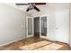 Bedroom with mirrored doors and tile flooring at 1749 W Desert Mountain Dr, San Tan Valley, AZ 85144