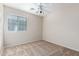 Bright bedroom with carpet flooring and ceiling fan at 1749 W Desert Mountain Dr, San Tan Valley, AZ 85144