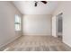 Well lit bedroom with ceiling fan and carpet flooring at 1749 W Desert Mountain Dr, San Tan Valley, AZ 85144