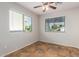 Well-lit bedroom with tile flooring and window blinds at 1749 W Desert Mountain Dr, San Tan Valley, AZ 85144