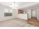 Bright dining room with carpeting and kitchen views at 1749 W Desert Mountain Dr, San Tan Valley, AZ 85144