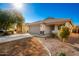 Front view of a one-story house with a yard at 1749 W Desert Mountain Dr, San Tan Valley, AZ 85144