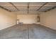 Garage with white walls and concrete flooring at 1749 W Desert Mountain Dr, San Tan Valley, AZ 85144