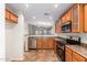 Open concept kitchen with stainless steel appliances at 1749 W Desert Mountain Dr, San Tan Valley, AZ 85144