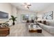 Living room with staged furniture and backyard access at 1749 W Desert Mountain Dr, San Tan Valley, AZ 85144