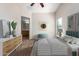 Main bedroom with stylish decor and ensuite bathroom at 1749 W Desert Mountain Dr, San Tan Valley, AZ 85144