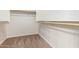 Large walk-in closet with double hanging rods at 1749 W Desert Mountain Dr, San Tan Valley, AZ 85144