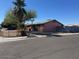 Exterior view of a single story house with a desert landscape, a chain link fence, and a corner lot at 17862 N 31St Ave, Phoenix, AZ 85053