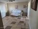 Living room with a couch, a window, and tiled floors at 17862 N 31St Ave, Phoenix, AZ 85053