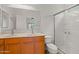 Bathroom with double sinks, shower and toilet at 19234 W Woodlands Ave, Buckeye, AZ 85326