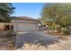 Single story home with attached garage at 19234 W Woodlands Ave, Buckeye, AZ 85326