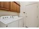 Laundry room with Whirlpool washer and dryer at 19550 N Grayhawk Dr # 1136, Scottsdale, AZ 85255