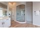 Bathroom with walk-in shower and built-in bench at 19608 N Regents Park Dr, Surprise, AZ 85387