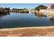 Community lake view with walking paths at 2030 N 108Th N Dr, Avondale, AZ 85392