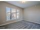 Well-lit bedroom with neutral walls and carpet flooring at 20660 N 40Th St # 2140, Phoenix, AZ 85050