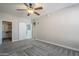 Large bedroom with sliding barn door and walk-in closet at 20660 N 40Th St # 2140, Phoenix, AZ 85050