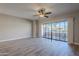 Living area with hardwood floors, sliding doors and a view at 20660 N 40Th St # 2140, Phoenix, AZ 85050