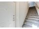 Interior view of carpeted staircase leading to upper level at 20660 N 40Th St # 2140, Phoenix, AZ 85050