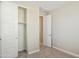 Spacious bedroom with large closet and door to hallway at 21047 N 58Th Way, Phoenix, AZ 85054