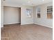 Spacious living room with tile flooring and large windows at 21047 N 58Th Way, Phoenix, AZ 85054