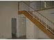 Indoor view of a wooden staircase with white railing at 2138 W Beaubien Dr, Phoenix, AZ 85027