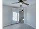 Bright bedroom with ceiling fan and view into another room at 2191 S Descanso Rd, Apache Junction, AZ 85119