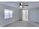 Charming bedroom with ensuite bathroom access and ceiling fan at 2191 S Descanso Rd, Apache Junction, AZ 85119