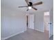 Well-lit bedroom with ceiling fan and ample closet space at 2191 S Descanso Rd, Apache Junction, AZ 85119