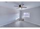 Bright bedroom featuring a ceiling fan and natural light at 2191 S Descanso Rd, Apache Junction, AZ 85119