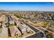 Aerial view of the house and surrounding neighborhood, including a nearby park at 22413 N 101St Ave, Peoria, AZ 85383