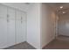 Bright hallway with white cabinets and carpeted floors at 22413 N 101St Ave, Peoria, AZ 85383