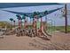 playground with shade structure and play equipment at 22413 N 101St Ave, Peoria, AZ 85383