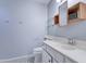 Bathroom with white vanity, glass shelves and patterned floor at 225 W 1St St # 118, Mesa, AZ 85201