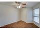 Spacious bedroom with ceiling fan, wood floors and sliding door closet at 225 W 1St St # 118, Mesa, AZ 85201