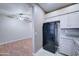 Bright kitchen with black refrigerator and light wood flooring at 225 W 1St St # 118, Mesa, AZ 85201