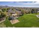 Aerial view of neighborhood park and surrounding homes at 2414 W Gambit Trl, Phoenix, AZ 85085