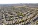 Aerial view of community with park and numerous houses at 2414 W Gambit Trl, Phoenix, AZ 85085