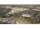 Aerial perspective of a shopping center and its surroundings at 2414 W Gambit Trl, Phoenix, AZ 85085