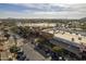 Aerial view of shopping center with stores and parking at 2414 W Gambit Trl, Phoenix, AZ 85085