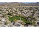 Aerial view of neighborhood park and surrounding homes at 2414 W Gambit Trl, Phoenix, AZ 85085